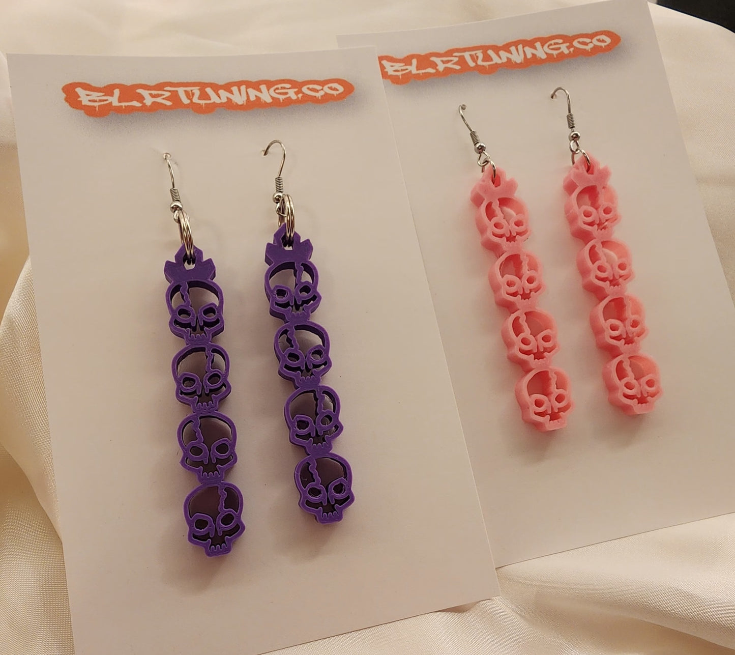 SKULL ROW EARRINGS